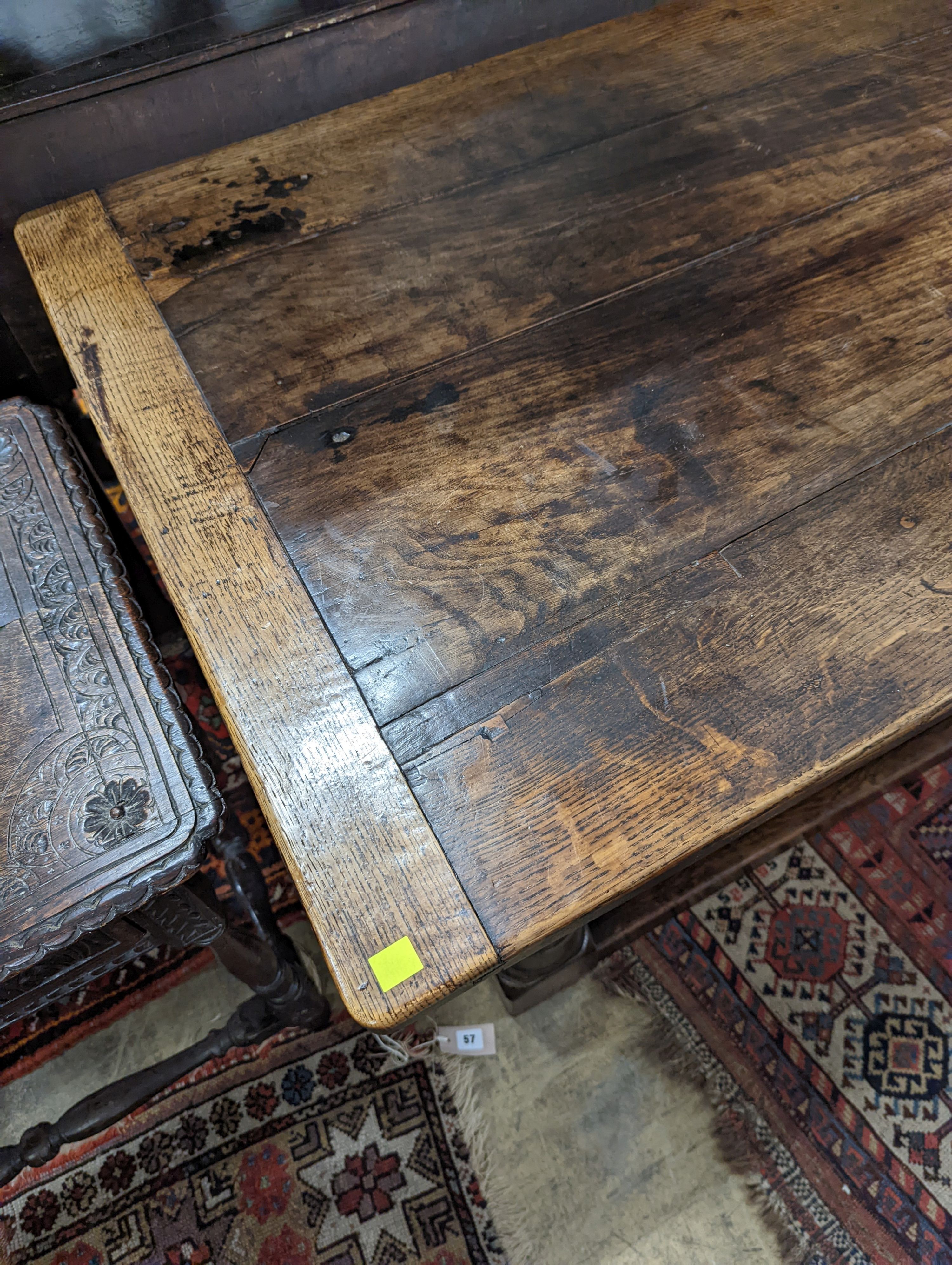 A 17th century rectangular oak refectory dining table, length 167cm, depth 74cm, height 76cm